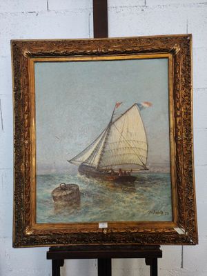 tableau représentant un voilier sur un plan d'eau, près d'un mur de briques blanches