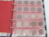 a binder with a lot of coins inside of it