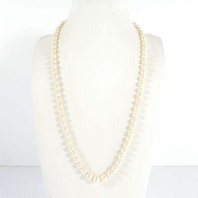 a close up of a necklace on a mannequin mannequin