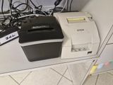 a picture of a printer sitting on top of a desk