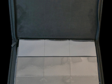an open suitcase with a lot of papers inside of it