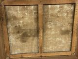 an old wooden window with a dirty glass pane in it