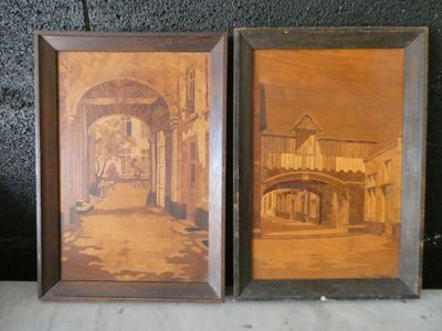 two framed pictures of a street with a building and a bridge