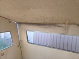 a small window in the back of a truck