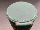 a close up view of a leather seat on a bike