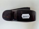 a black belt that has a white tag on it