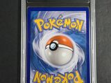 a close up of a pokemon card on a table
