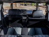 a view of the inside of a car from the driver ' s seat
