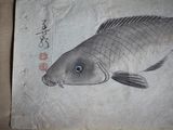 un dessin représentant un poisson sur une feuille de papier