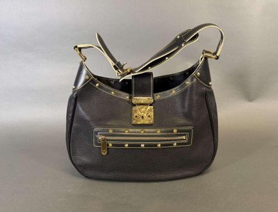 Louis Vuitton. Sac "l'Affriolant" porté épaule en cuir Suhal…