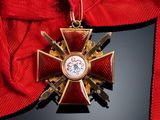 an image of a red ribbon with a gold cross on it