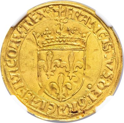a close up of a gold coin with a crown on it