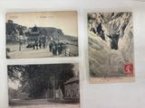 several old postcards of people walking down a street in the snow