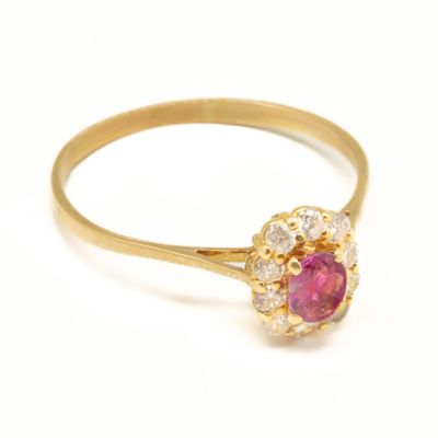 Bague marguerite en or jaune 18 K (750/1000) centré d'un rub…