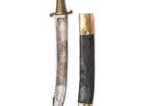 two knives with gold and black handles on a white background
