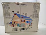 a cardboard box with a picture of a house inside of it