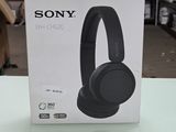 the sony headphones are in the box on the table