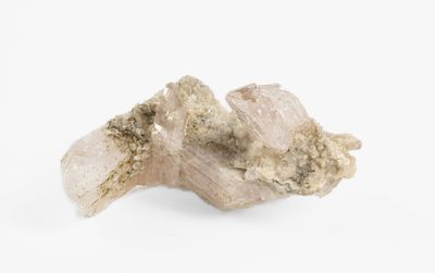 a close up of a piece of rock on a white surface