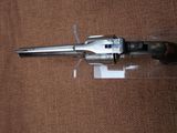 a gun that is sitting on a table