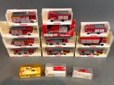many different types of toy fire trucks in the box