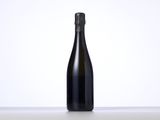 a bottle of champagne sitting on top of a table