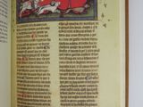 an open book with a picture of a man riding a horse