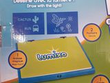 the box is open to show the contents of a laptop