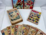 a bunch of comics are sitting on a white surface