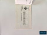 a piece of paper that has been placed on top of a refrigerator