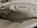 chanel beige leather handbag with silver hardware