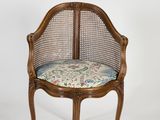 an image of a chair with a cushion on it