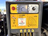 an image of a machine that is on the ground