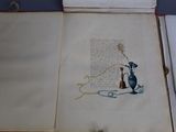 an open book with a picture of a cat and a bird on it