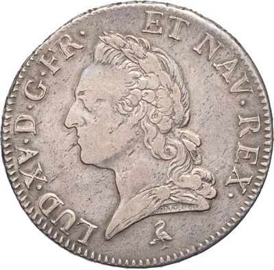 une pièce d'argent représentant la tête d'un homme de profil