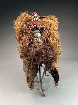 an image of a sculpture of a person with a hat on
