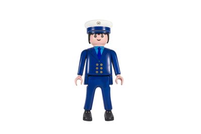 une figurine représentant un homme en costume bleu et chapeau