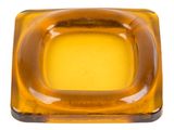 yellow square shaped glass ashtray on a white background