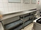 an image of a commercial kitchen with stainless steel appliances