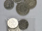 a lot of coins in a bag on the table