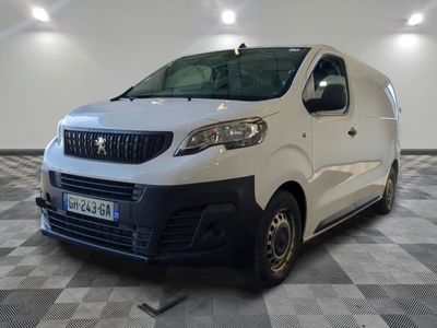 a picture of a white van parked on a checkered floor