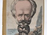 un vieux livre sur lequel figure la photo d'un homme moustachu