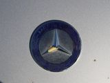 a mercedes emblem on the hood of a car