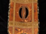 an image of a decorative piece of cloth on a stand