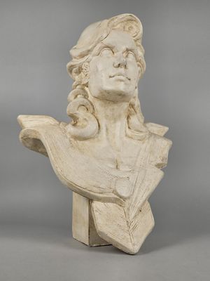 a white marble bust of a woman with long hair