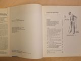an open book with a drawing of a man holding a golf club