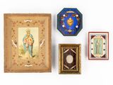 three framed pictures of jesus and other religious items on a white surface
