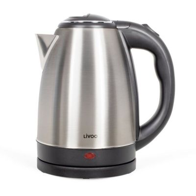 the electric kettle is sitting on a white surface