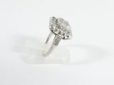 an image of a diamond ring sitting on top of a clear block