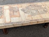 a table made out of pallet wood with a picture on it