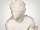 an image of a statue of a woman with her hands on her chest